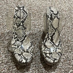 Express snakeskin platform wedge with clear straps. NWOT
